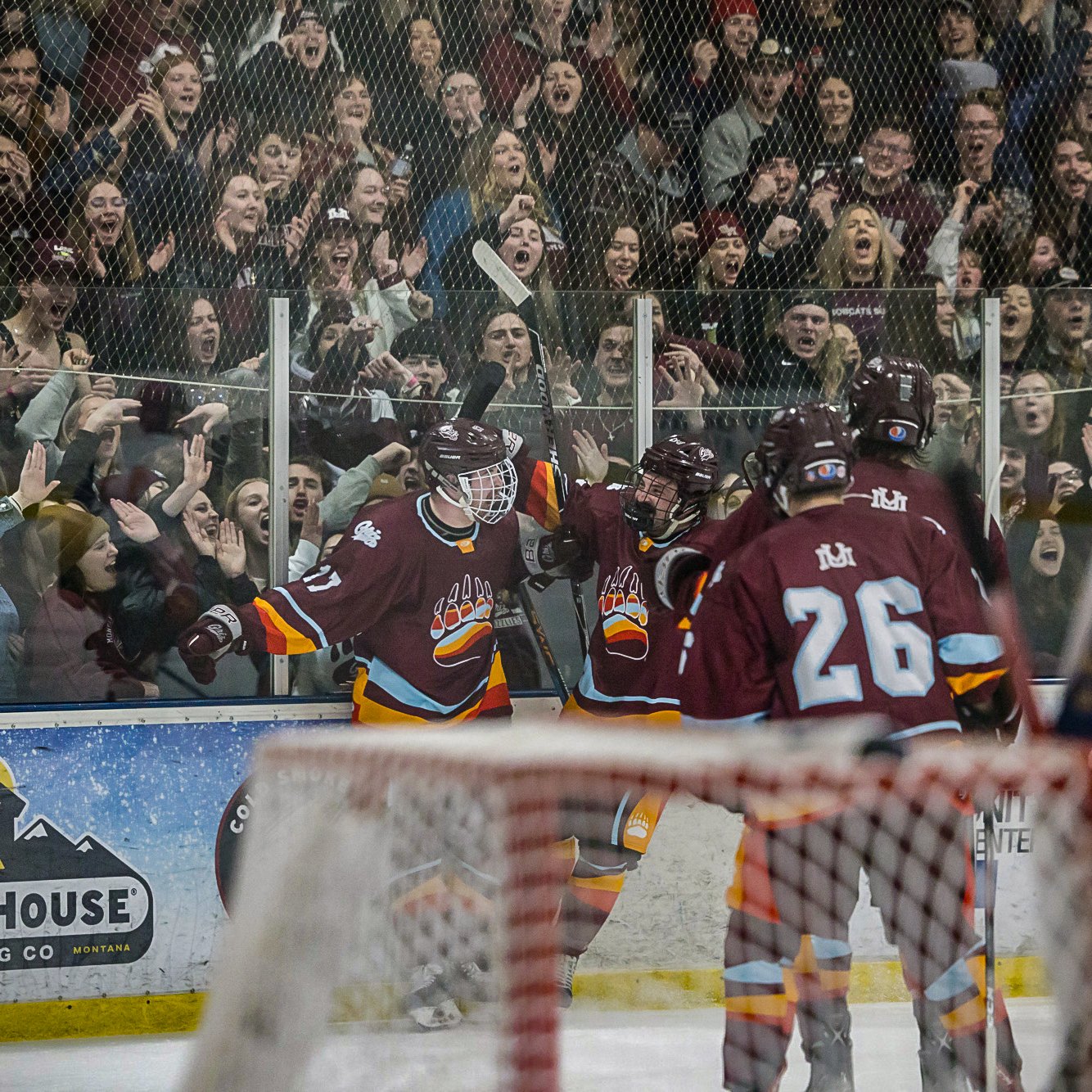 Fans at a Montana Griz hockey game
